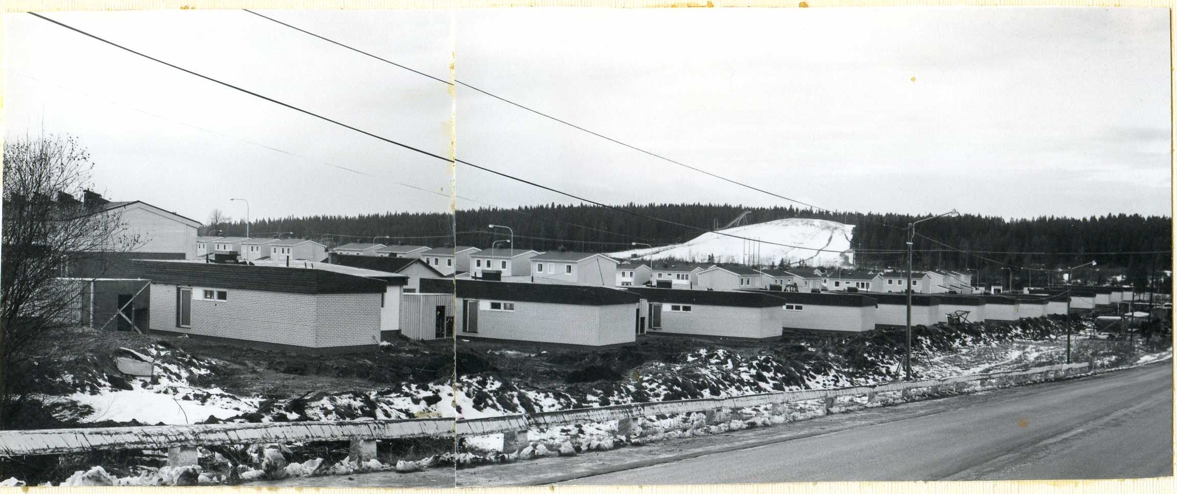 Nybyggen med Bräntberget i bakgrunden